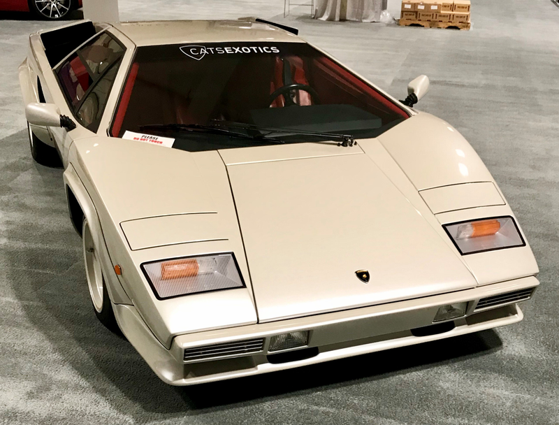 This color combination is sooooo good (champagne white pearly exterior and wheels, rich red interior). But all I could think about was James May talking about how you should never meet your heroes.
